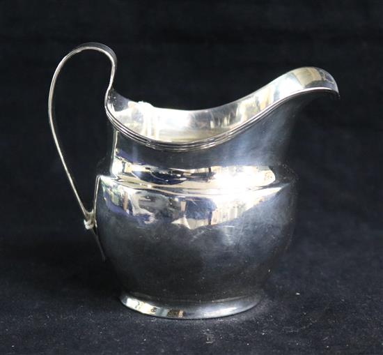 A George III silver cream jug, London, 1805, 10cm.